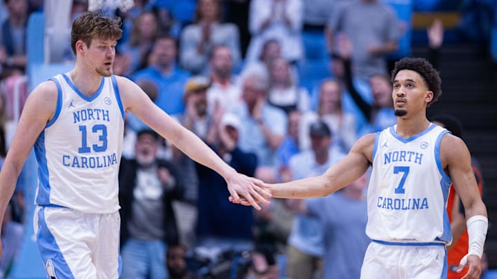 Mar 3, 2026; Chapel Hill, North Carolina, USA; North Carolina Tar Heels center Henri Veesaar (13) celebrates with guard Seth Trimble (7) during the second half against the Clemson Tigers at Dean E. Smith Center. Mandatory Credit: Scott Kinser-Imagn Images
