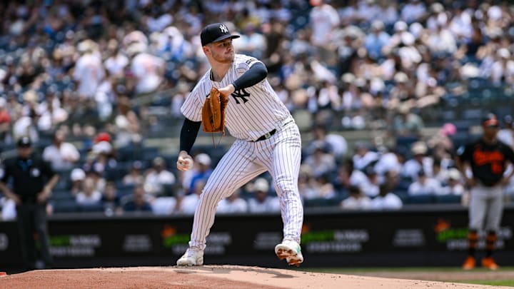 Jun 21, 2025; Bronx, New York, USA; New York Yankees pitcher Clarke Schmidt (36) pitches against the Baltimore Orioles during the first inning at Yankee Stadium. Mandatory Credit: John Jones-Imagn Images