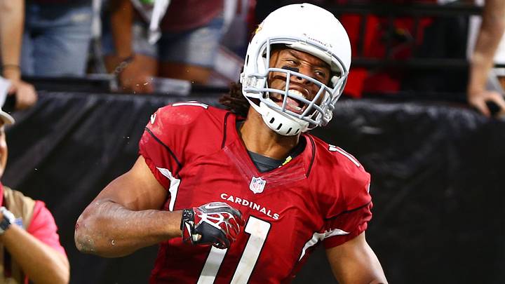 Oct 26, 2014; Glendale, AZ, USA; Arizona Cardinals wide receiver Larry Fitzgerald celebrates a fourth quarter touchdown against the Philadelphia Eagles at University of Phoenix Stadium. The Cardinals defeated the Eagles 24-20. Mandatory Credit: Mark J. Rebilas-USA TODAY Sports Oct 26, 2014; Glendale, AZ, USA; Arizona Cardinals wide receiver Larry Fitzgerald celebrates a fourth quarter touchdown against the Philadelphia Eagles at University of Phoenix Stadium. The Cardinals defeated the Eagles 24-20. Mandatory Credit: Mark J. Rebilas-USA TODAY Sports