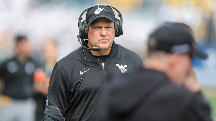 Oct 10, 2026; Morgantown, West Virginia, USA; West Virginia Mountaineers head coach Rich Rodriguez walks along the sideline during the first quarter against the Arizona Wildcats at Milan Puskar Stadium. Mandatory Credit: Ben Queen-Imagn Images Oct 10, 2026; Morgantown, West Virginia, USA; West Virginia Mountaineers head coach Rich Rodriguez walks along the sideline during the first quarter against the Arizona Wildcats at Milan Puskar Stadium. Mandatory Credit: Ben Queen-Imagn Images
