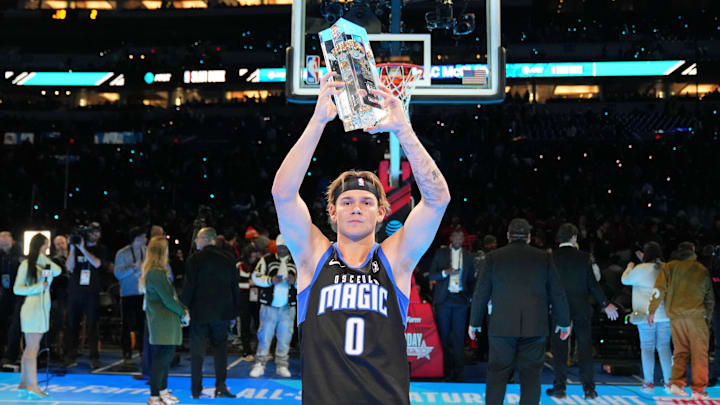 Mac McClung celebrates his 2024 slam dunk contest victory.