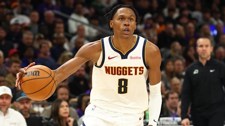 Nov 29, 2025; Phoenix, Arizona, USA; Denver Nuggets guard Peyton Watson (8) against the Phoenix Suns at the Mortgage Matchup Center. 