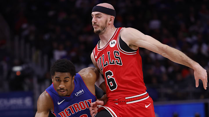 Apr 11, 2024; Detroit, Michigan, USA; Detroit Pistons guard Jaden Ivey (23) dribbles on Chicago Bulls guard Alex Caruso (6) in the first half at Little Caesars Arena. Mandatory Credit: Rick Osentoski-Imagn Images Apr 11, 2024; Detroit, Michigan, USA; Detroit Pistons guard Jaden Ivey (23) dribbles on Chicago Bulls guard Alex Caruso (6) in the first half at Little Caesars Arena. Mandatory Credit: Rick Osentoski-Imagn Images