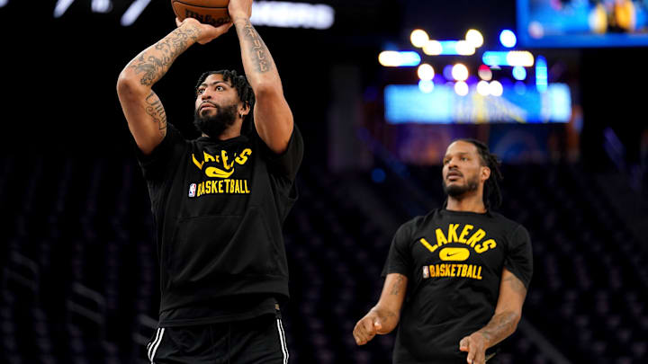 Feb 12, 2022; San Francisco, California, USA; Los Angeles Lakers forward Anthony Davis (3) warms up in front of forward Trevor Ariza (1) before the start of the game against the Golden State Warriors at the Chase Center. Mandatory Credit: Cary Edmondson-Imagn Images Feb 12, 2022; San Francisco, California, USA; Los Angeles Lakers forward Anthony Davis (3) warms up in front of forward Trevor Ariza (1) before the start of the game against the Golden State Warriors at the Chase Center. Mandatory Credit: Cary Edmondson-Imagn Images