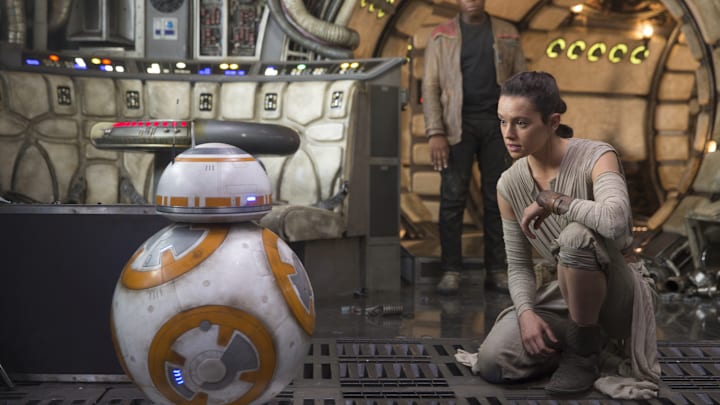 Star Wars: The Force Awakens..L to R: BB-8, Finn (John Boyega) and Rey (Daisy Ridley)..Photo: David James.. ©2016 Lucas Film Ltd. All Rights Reserved. 