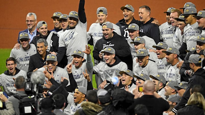 Oct 19, 2024; Cleveland, Ohio, USA; The New York Yankees celebrate after beating the Cleveland Guardians during game five of the ALCS for the 2024 MLB playoffs at Progressive Field. Mandatory Credit: David Richard-Imagn Images