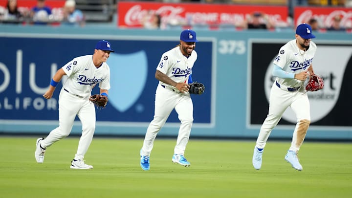 Aug 8, 2025; Los Angeles, California, USA; Los Angeles Dodgers left fielder Alex Call (left), center fielder Justin Dean (75) and center fielder Andy Pages (44) react at the end of the game against the Toronto Blue Jays at Dodger Stadium. Mandatory Credit: Kirby Lee-Imagn Images Aug 8, 2025; Los Angeles, California, USA; Los Angeles Dodgers left fielder Alex Call (left), center fielder Justin Dean (75) and center fielder Andy Pages (44) react at the end of the game against the Toronto Blue Jays at Dodger Stadium. Mandatory Credit: Kirby Lee-Imagn Images