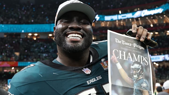 Philadelphia Eagles offensive guard Mekhi Becton (77) celebrates on the field after Super Bowl LIX against the Kansas City Chiefs at Caesars Superdome. Philadelphia Eagles offensive guard Mekhi Becton (77) celebrates on the field after Super Bowl LIX against the Kansas City Chiefs at Caesars Superdome.