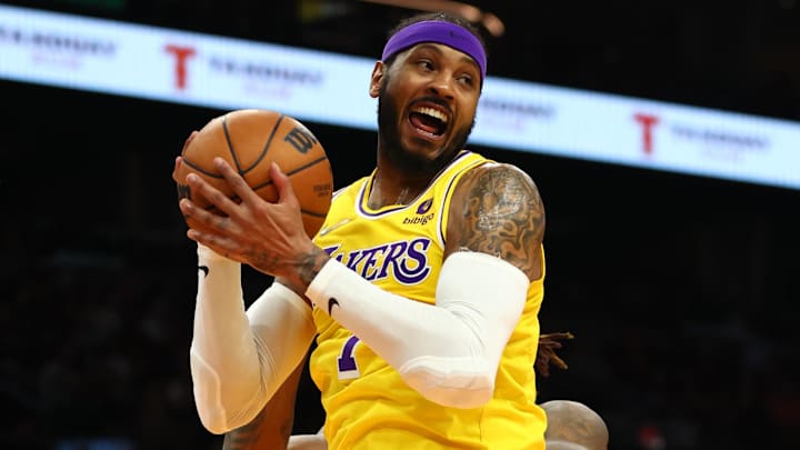 Apr 5, 2022; Phoenix, Arizona, USA; Los Angeles Lakers forward Carmelo Anthony (7) against the Phoenix Suns at Footprint Center. Mandatory Credit: Mark J. Rebilas-Imagn Images