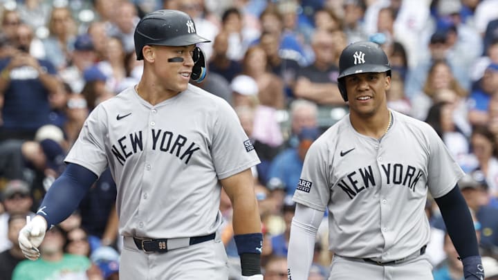 Sep 6, 2024; Chicago, Illinois, USA; New York Yankees outfielder Aaron Judge (99) and New York Yankees outfielder Juan Soto (22) celebrate after scoring agianst the Chicago Cubs during the third inning at Wrigley Field. Mandatory Credit: Kamil Krzaczynski-Imagn Images Sep 6, 2024; Chicago, Illinois, USA; New York Yankees outfielder Aaron Judge (99) and New York Yankees outfielder Juan Soto (22) celebrate after scoring agianst the Chicago Cubs during the third inning at Wrigley Field. Mandatory Credit: Kamil Krzaczynski-Imagn Images