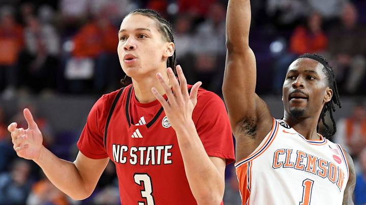 NC State Wolfpack guard Matt Able (3) watches the shot of Clemson Tigers guard Jestin Porter (1) Tuesday, Jan. 20, 2026, during the NCAA men’s basketball game at Littlejohn Coliseum in Clemson, South Carolina.