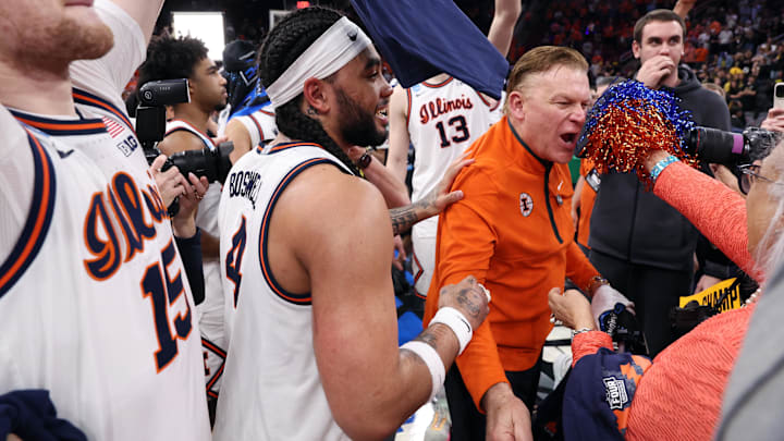 Mar 28, 2026; Houston, TX, USA; Illinois Fighting Illini head coach Brad Underwood celebrates with guard Kylan Boswell (4) after defeating the Iowa Hawkeyes in the Elite Eight.