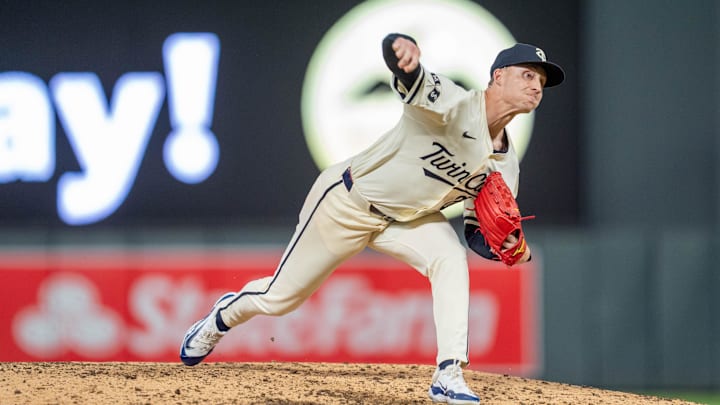 Sep 26, 2024; Minneapolis, Minnesota, USA; Minnesota Twins pitcher Griffin Jax (22) pitches in the seventh inning against the Miami Marlins at Target Field. Mandatory Credit: Matt Blewett-Imagn Images