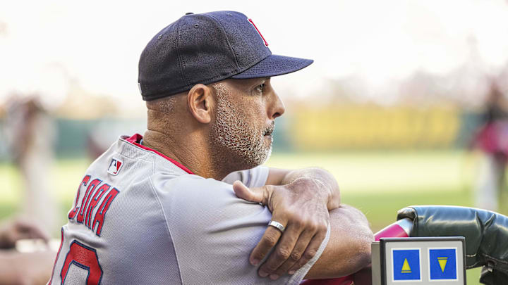 May 30, 2025; Cumberland, Georgia, USA; Boston Red Sox manager Alex Cora (13) in the dugout against the Atlanta Braves during the first inning at Truist Park. Mandatory Credit: Dale Zanine-Imagn Images