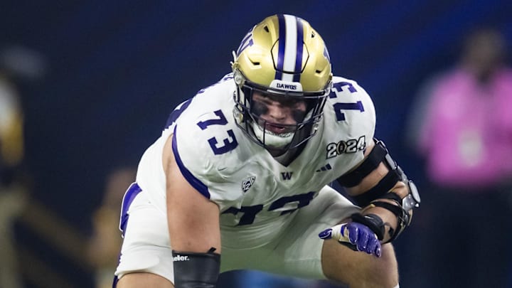Jan 8, 2024; Houston, TX, USA; Washington Huskies offensive lineman Roger Rosengarten (73) against Jan 8, 2024; Houston, TX, USA; Washington Huskies offensive lineman Roger Rosengarten (73) against