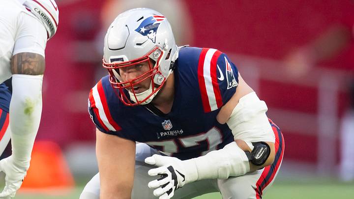 Dec 15, 2024; Glendale, Arizona, USA; New England Patriots center Ben Brown (77) against the Arizona Cardinals at State Farm Stadium. Mandatory Credit: Mark J. Rebilas-Imagn Images Dec 15, 2024; Glendale, Arizona, USA; New England Patriots center Ben Brown (77) against the Arizona Cardinals at State Farm Stadium. Mandatory Credit: Mark J. Rebilas-Imagn Images
