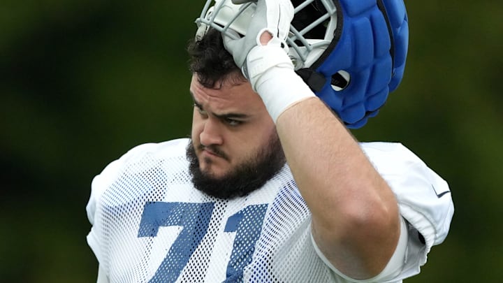 Indianapolis Colts offensive tackle Matt Goncalves (71) puts on his helmet during a joint practice with the Arizona Cardinals on Thursday, Aug. 15, 2024, at Grand Park Sports Complex in Westfield.