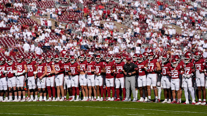 The Oklahoma team locks arms before a college football game between the University of Oklahoma Sooners (OU) and the South Carolina Gamecocks at Gaylord Family - Oklahoma Memorial Stadium in Norman, Okla., Saturday, Oct. 19, 2024.