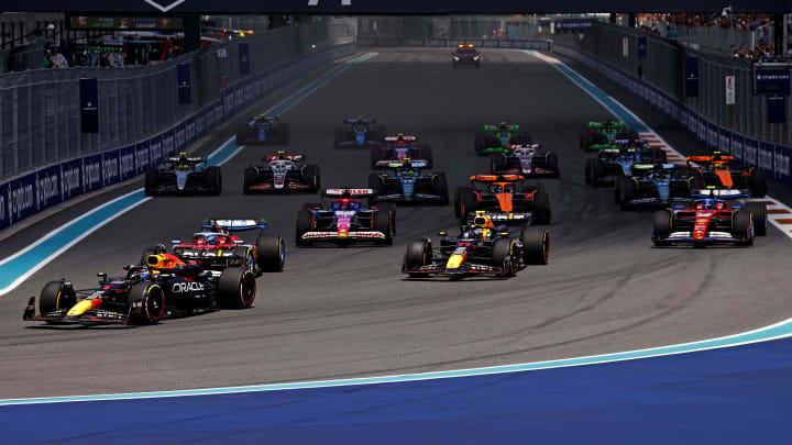May 4, 2024; Miami Gardens, Florida, USA; Red Bull Racing driver Max Verstappen (1) leads the start of the F1 Sprint Race at Miami International Autodrome. Mandatory Credit: Peter Casey-USA TODAY Sports