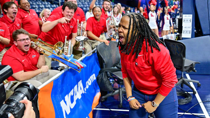 Mar 23, 2024; South Bend, Indiana, USA; Ole Miss Rebels head coach Yolett McPhee-McCuin celebrates with the Ole Miss band after defeating the Marquette Golden Eagles 67-55 in the first round of the NCAA Tournament at the Purcell Pavilion. Mandatory Credit: Matt Cashore-Imagn Images