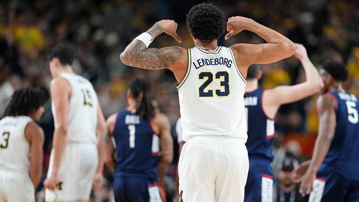 Apr 6, 2026; Indianapolis, IN, USA; Michigan Wolverines forward Yaxel Lendeborg (23) reacts after a play against the UConn Huskies during the first half in the national championship of the Final Four of the men's 2026 NCAA Tournament between the and the Michigan Wolverines at Lucas Oil Stadium. Mandatory Credit: Bob Donnan-Imagn Images Apr 6, 2026; Indianapolis, IN, USA; Michigan Wolverines forward Yaxel Lendeborg (23) reacts after a play against the UConn Huskies during the first half in the national championship of the Final Four of the men's 2026 NCAA Tournament between the and the Michigan Wolverines at Lucas Oil Stadium. Mandatory Credit: Bob Donnan-Imagn Images