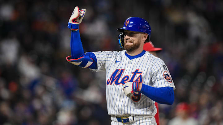 Apr 21, 2025; New York City, New York, USA; New York Mets outfielder Brandon Nimmo (9) reacts after hitting a single against the Philadelphia Phillies during the sixth inning at Citi Field. Mandatory Credit: John Jones-Imagn Images