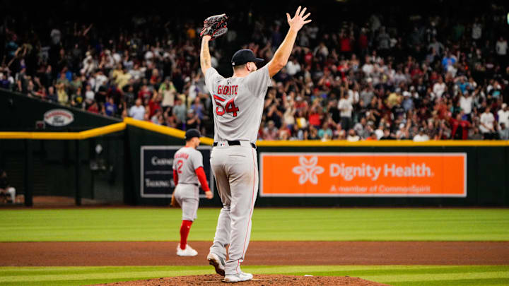 Sep 6, 2025; Phoenix, Arizona, USA; Boston Red Sox pitcher Lucas Giolito (54) celebrates after Boston Red Sox outfielder Ceddanne Rafaela (3) robs a home run during the fifth inning against the Arizona Diamondbacks at Chase Field. Mandatory Credit: Arianna Grainey-Imagn Images