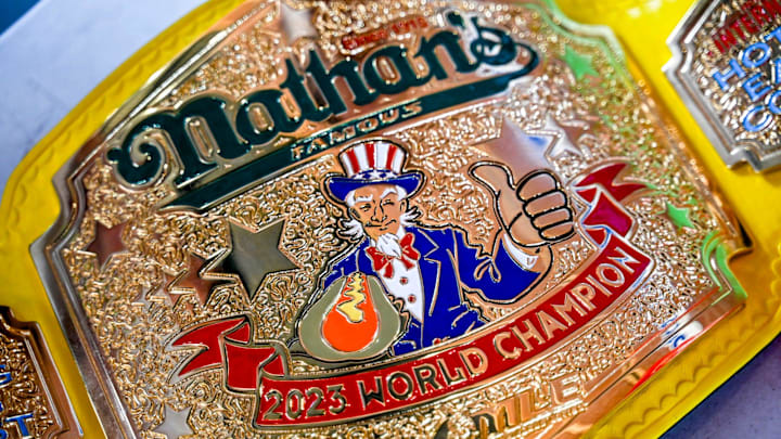 Nathan's Hot Dog Eating champion Joey Chestnut's belt before the Lugnuts game against the TinCaps on Thursday, Aug. 10, 2023, at Jackson Field in Lansing. Chestnut was participating in an olive burger eating contest before the game.