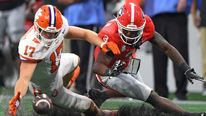 Aug 31, 2024; Atlanta, Georgia, USA; Clemson Tigers linebacker Wade Woodaz (17) reaches for an incomplete pass against Georgia Bulldogs running back Nate Frazier (3)  during the third quarter of the 2024 Aflac Kickoff Game at Mercedes-Benz Stadium. 
