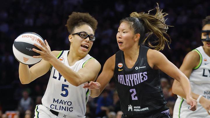 Jun 4, 2026; Minneapolis, Minnesota, USA; Minnesota Lynx guard Olivia Miles (5) drives to the basket against Golden State Valkyries guard Kaitlyn Chen (2) in the third quarter at Target Center. Mandatory Credit: Bruce Kluckhohn-Imagn Images