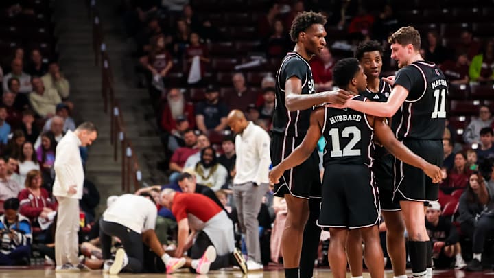 Mississippi State Bulldogs players huddle as injured teammate guard Jayden Epps (10) is tended to against the South Carolina Gamecocks in the first half at Colonial Life Arena.