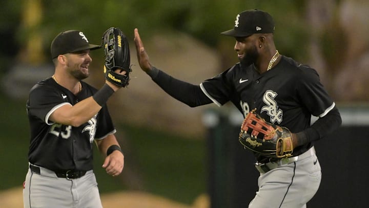 Chicago White Sox left fielder Andrew Benintendi and center fielder Luis Robert Jr. Chicago White Sox left fielder Andrew Benintendi and center fielder Luis Robert Jr.