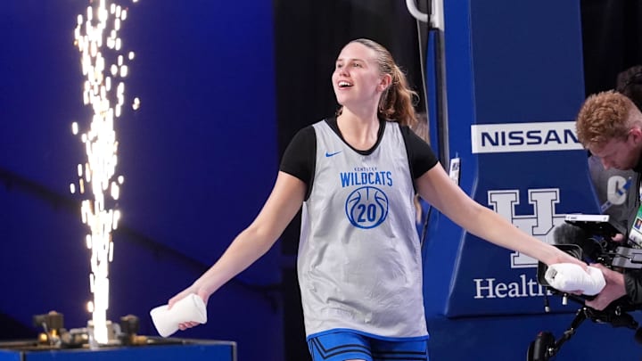 Kentucky’s Kaelyn Carroll comes out onto the court as the Blue and White team scrimmaged each other in Memorial Coliseum Friday night.
Oct. 17, 2025