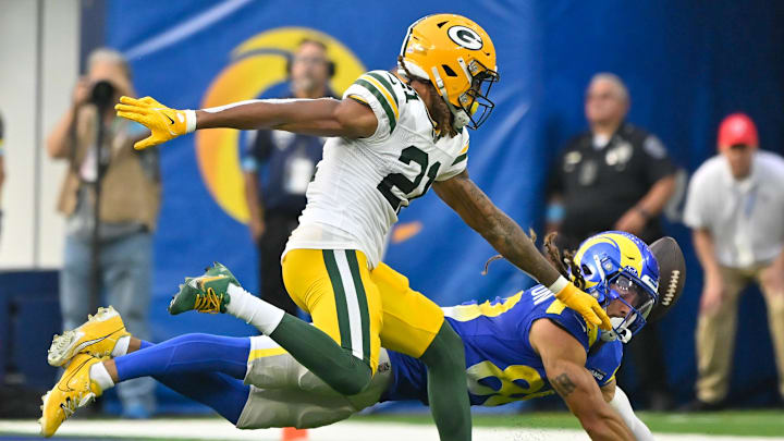 Green Bay Packers cornerback Eric Stokes (21) prevents a completion to Los Angeles Rams wide receiver Jordan Whittington.