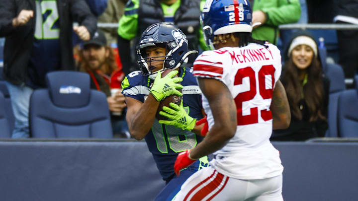Oct 30, 2022; Seattle, Washington, USA; Seattle Seahawks wide receiver Tyler Lockett (16) catches a touchdown against the New York Giants during the fourth quarter at Lumen Field. Mandatory Credit: Joe Nicholson-Imagn Images