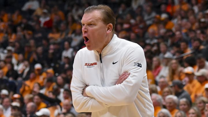  Dec 6, 2025; Nashville, Tennessee, USA;  Illinois Fighting Illini head coach Brad Underwood yells to his team against the Tennessee Volunteersduring the first half at Bridgestone Arena. Mandatory Credit: Steve Roberts-Imagn Images