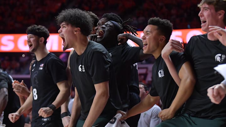 Feb 15, 2025; Champaign, Illinois, USA; Michigan State players cheer on their teammate during the second half against the Illinois Fighting Illini at State Farm Center. Mandatory Credit: Ron Johnson-Imagn Images