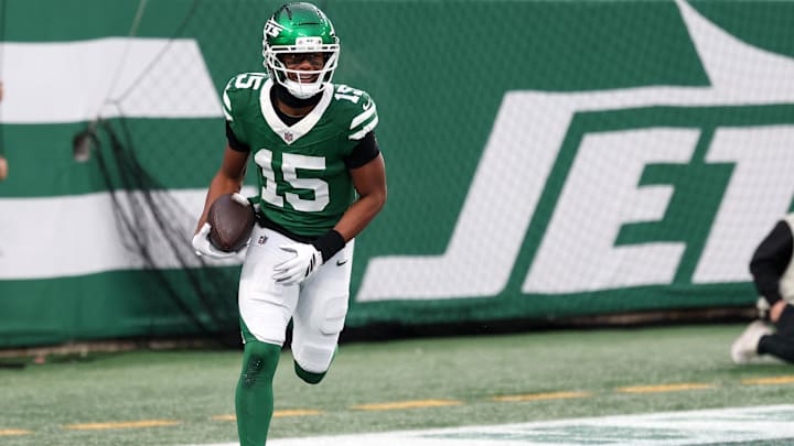 Nov 30, 2025; East Rutherford, New Jersey, USA;New York Jets wide receiver Adonai Mitchell (15) reacts after a touchdown catch against the Atlanta Falcons during the second half at MetLife Stadium. Mandatory Credit: Vincent Carchietta-Imagn Images