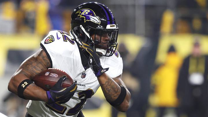 Jan 4, 2026; Pittsburgh, Pennsylvania, USA; Baltimore Ravens running back Derrick Henry (22) rushes the ball against the Pittsburgh Steelers during the first half at Acrisure Stadium. Mandatory Credit: Charles LeClaire-Imagn Images