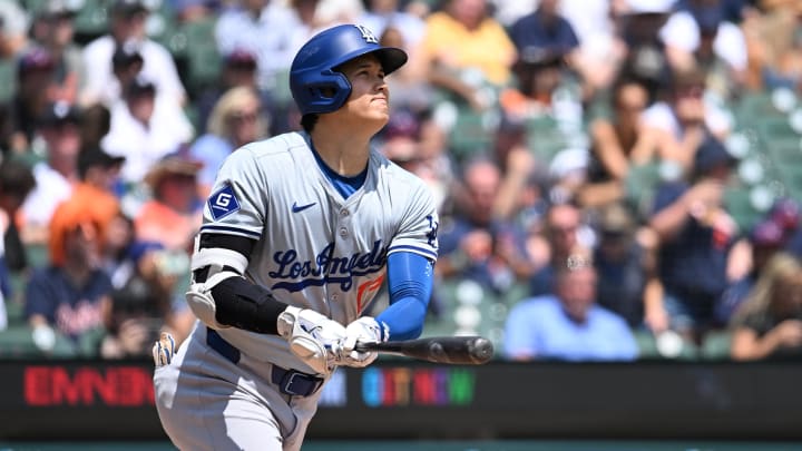 Los Angeles Dodgers designated hitter Shohei Ohtani (17) hits a solo home run against the  Detroit Tigers.