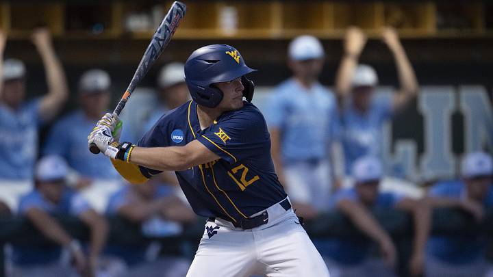 Jun 8, 2024; Chapel Hill, NC, USA; West Virginia Mountaineers Brodie Kresser (12) bats against the North Carolina Tar Heels in the second inning of the DI Baseball Super Regional at Boshamer Stadium. Mandatory Credit: Jeffrey Camarati-Imagn Images