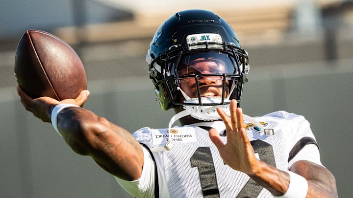 Jacksonville Jaguars wide receiver Travis Hunter (12) throws a football during a drill during an NFL training camp fourth session at the Miller Electric Center, Sunday, July 27, 2025, in Jacksonville, Fla. [Doug Engle/Florida Times-Union]