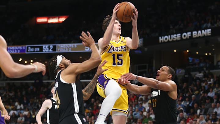 Mar 27, 2024; Memphis, Tennessee, USA; Los Angeles Lakers guard Austin Reaves (15) drives to the basket against the Memphis Grizzlies. Mar 27, 2024; Memphis, Tennessee, USA; Los Angeles Lakers guard Austin Reaves (15) drives to the basket against the Memphis Grizzlies.