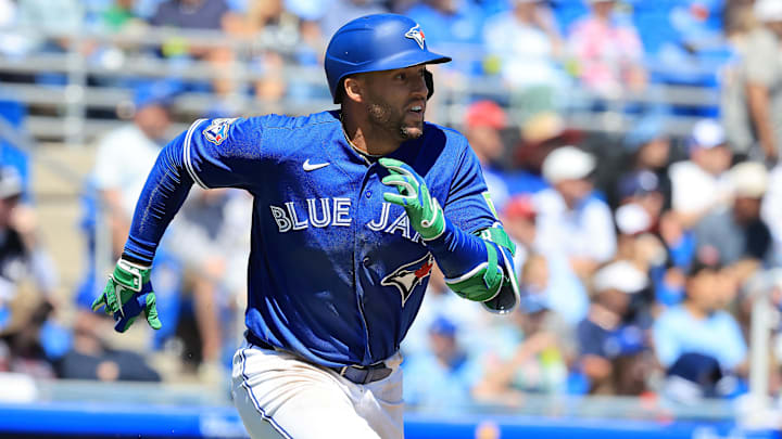 Mar 19, 2026; Dunedin, Florida, USA; Toronto Blue Jays designated hitter George Springer (4) doubles during the fifth inning against the New York Yankees at TD Ballpark. 