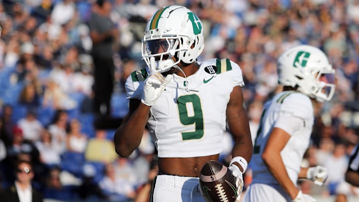 Oct 19, 2024; Annapolis, Maryland, USA; Charlotte 49ers wide receiver O'Mega Blake (9) celebrates after scoring a touchdown during the first half against the Navy Midshipmen at Navy-Marine Corps Memorial Stadium. Mandatory Credit: Daniel Kucin Jr.-Imagn Images Oct 19, 2024; Annapolis, Maryland, USA; Charlotte 49ers wide receiver O'Mega Blake (9) celebrates after scoring a touchdown during the first half against the Navy Midshipmen at Navy-Marine Corps Memorial Stadium. Mandatory Credit: Daniel Kucin Jr.-Imagn Images
