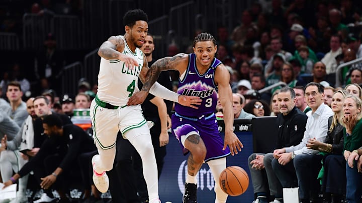 Nov 3, 2025; Boston, Massachusetts, USA; Utah Jazz guard Keyonte George (3) controls the ball while Boston Celtics guard Anfernee Simons (4) defends during the second half at TD Garden. Mandatory Credit: Bob DeChiara-Imagn Images Nov 3, 2025; Boston, Massachusetts, USA; Utah Jazz guard Keyonte George (3) controls the ball while Boston Celtics guard Anfernee Simons (4) defends during the second half at TD Garden. Mandatory Credit: Bob DeChiara-Imagn Images