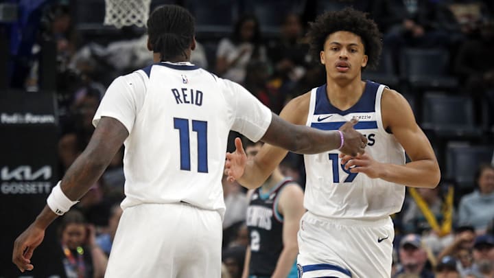 Jan 31, 2026; Memphis, Tennessee, USA; Minnesota Timberwolves forward Joan Beringer (19) reacts with center Naz Reid (11) during the second quarter against the Memphis Grizzlies at FedExForum. Jan 31, 2026; Memphis, Tennessee, USA; Minnesota Timberwolves forward Joan Beringer (19) reacts with center Naz Reid (11) during the second quarter against the Memphis Grizzlies at FedExForum.