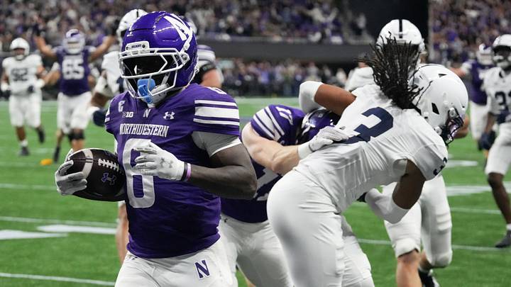 Northwestern Wildcats running back Joseph Himon II (6) runs the ball for a touchdown against the Penn State Nittany Lions during the half quarter at New Ryan Field. Northwestern Wildcats running back Joseph Himon II (6) runs the ball for a touchdown against the Penn State Nittany Lions during the half quarter at New Ryan Field.