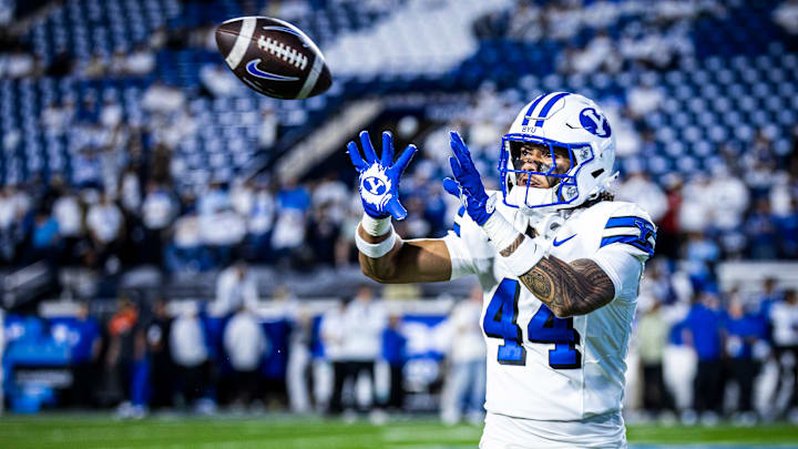 BYU DE Ephraim Asiata warms up for game against Kansas State BYU DE Ephraim Asiata warms up for game against Kansas State