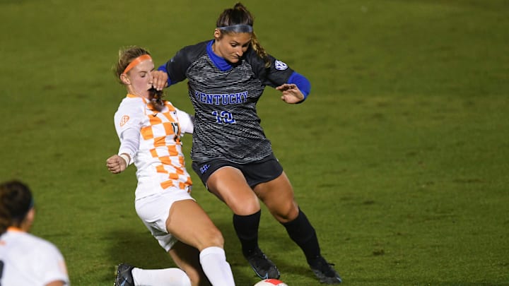 Tennessee midfielder Jenna Chatterton (17) tries to steal the ball from Kentucky midfielder Gretchen Mills (12) in the NCAA women's soccer match between the Tennessee Lady Vols and Kentucky Wildcats in Knoxville, Tenn. on Thursday, October 28, 2021.

Kns Lady Vols Soccer